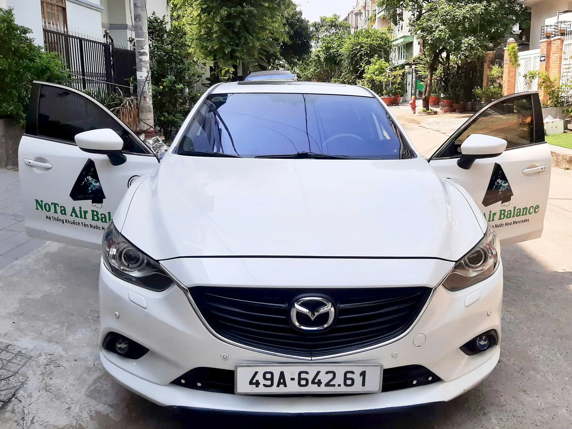 Xe Mazda 6 sau khi hoàn thiện dán phim cách nhiệt ô tô của Rainier